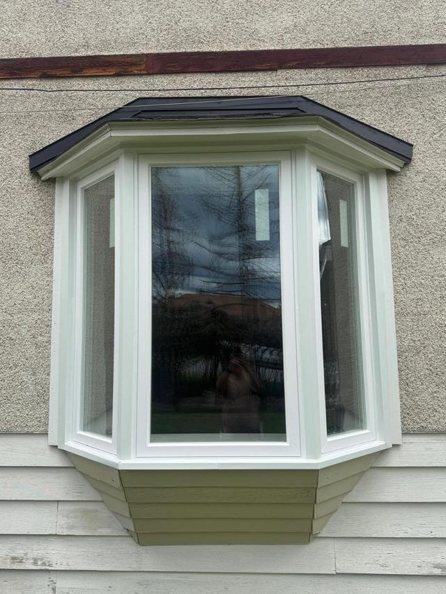 Newly installed bay window on a home